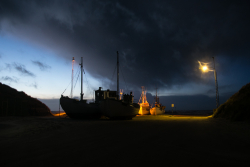 Fischerboote bei Nacht